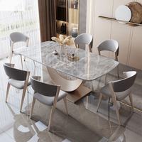 Ensemble de salle à manger rectangulaire brillant en forme de croissant, moderne, simple, de luxe léger et haut de gamme, avec table en ardoise et chaises, pour restaurant et maison