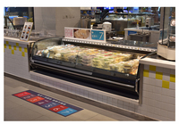Vitrine réfrigérée incurvée pour fruits de mer avec refroidissement par air, grande capacité, unité commerciale pour les épiceries