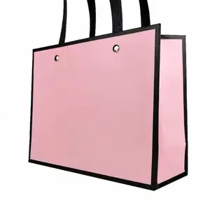 Toptan lüks özel desen katlanmış hediye kağıt alışveriş torbası Logo ile giysi ambalaj çantası moda giyim sarma çanta