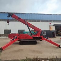 Grue araignée pour l'installation de panneaux texturés avec ventouse de levage par aspiration sur chenilles