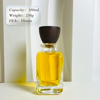 Bouteille de parfum de cube carré de prix bas d'usine 30ml 50ml 100ml bouteilles en verre de parfum de parfum de jet clair avec le chapeau en bois