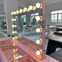 Commode rose de luxe avec haut-parleur Bluetooth et miroir de maquillage à lumière LED, coiffeuse avec 13 tiroirs pour ensembles de chambre à coucher, fabricant