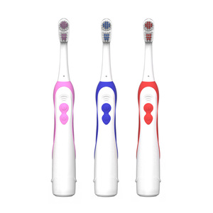 Brosse à dents électrique Weston pour adultes, tête ronde rotative, poils doux, alimentée par piles, étanche IPX4, corps en plastique, bleu, rose, rouge - Product Image 1