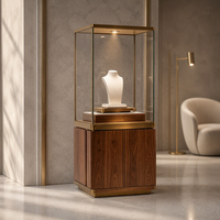 Vitrine de présentation de bijoux en bois grainé sur mesure avec tour en verre et cadre doré, éclairée, pour magasin de bijoux, vente en gros