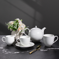 Blanc moderne Hôtel Restaurant Cuisine Utilisé Ensemble de Café en Céramique de Tasses à Thé Porcelaine Embossée Espresso Théière Tasse et Soucoupe Ensemble