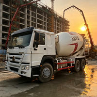 Camion malaxeur à béton SINOTRUK HOWO 6X4 pour le transport de ciment, avec tambour renforcé et dispositif de protection pour une utilisation sécurisée