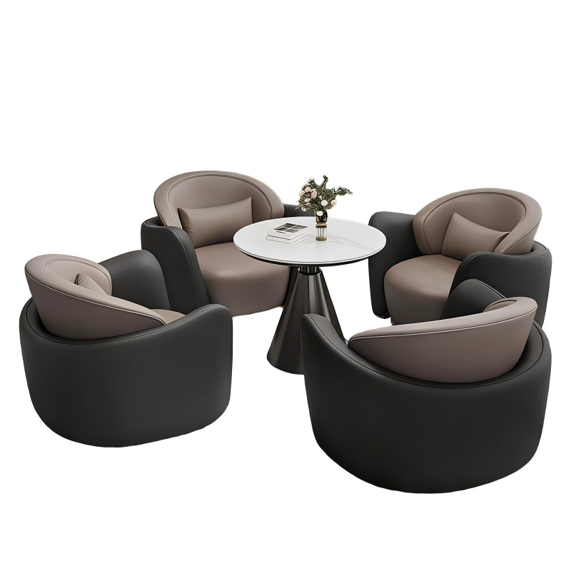 Une table et quatre chaises (noires et grises)