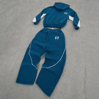 Ensemble deux pièces unisexe personnalisé en coton 100% : sweat à capuche court imprimé color block et pantalon de survêtement large brodé style gothique pour l'hiver
