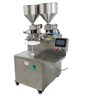 Machine automatique pour la distribution, l'étalement et la décoration de gâteaux, pour la crème, le glaçage et les garnitures aux œufs, mangue et autres ingrédients