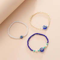 Bracelet ethnique fait main en perles de riz, œil de diable multicolore en résine tressée, bracelet œil bleu, bijoux bohèmes