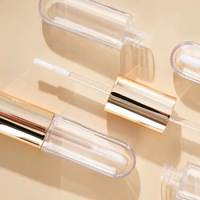 Tube de gloss et de mascara double embout luxueux doré de 4 ml avec emballage transparent pour gloss
