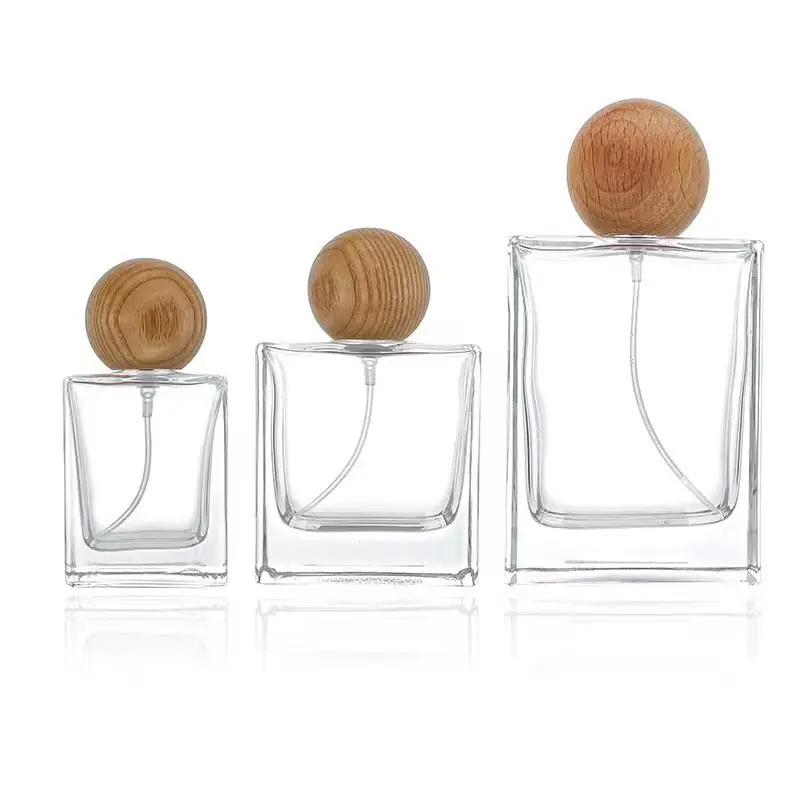 Toptan lüks parfum şişeleri 50 ml yuvarlak silindir boş 25ml 50 ml 100ml parfüm parfüm cam sprey şişe konteyner