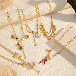 Groothandel 18K verguld roestvrijstalen ketting in oceaanstijl voor dames - schelp-, zon- en zeesterbedel, modieus juweel - Product Image 3