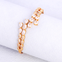 Ensemble bague et bracelet de luxe en forme de goutte d'eau, demi-grand diamant, demi-petit diamant, ouverture en forme de balle, accessoire de mode pour femme
