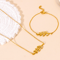 Parures de bijoux fantaisie en gros, plaqué or 18 carats, acier inoxydable, zircon, pendentif feuille, collier et bracelet pour femmes