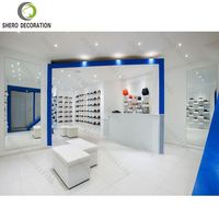 Design de salle d'exposition de chaussures moderne personnalisé Présentoir à chaussures mural avec lumière LED Meubles de présentoir à chaussures