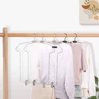 D5098 Vente en gros de cintres pour vêtements, forme de corps, cintre pour vêtements en une seule pièce, cintres en fil métallique avec pince en plastique pour garde-robe, manteau