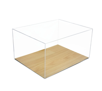 Vitrine transparente de chaussures de basket-ball en acrylique de luxe avec plancher en bois