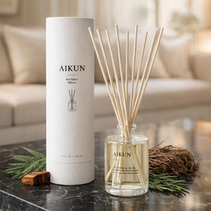Aikun Natural 150ml Clear Glass Bottle Cylinder Box MMB Amber Vanilla Fragrance Plant Based Reed <b>Diffuser</b> For Wooden Table Scene - Product Image 1