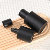 Flacon de parfum vide personnalisé avec logo personnalisé de 30ml 50ml 100ml Flacon vaporisateur de parfum en verre rond noir givré avec couvercle noir
