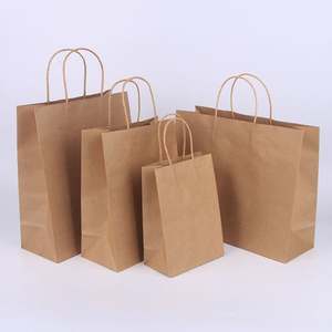 Sac en papier kraft pour emballage cadeau de marque de vente au détail, avec logo imprimé, couleur personnalisée KM, nouveaux matériaux, bon prix - Product Image 2