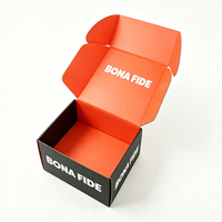 Boîte d'expédition personnalisée avec logo, intérieur noir et orange, en carton ondulé, pour les entreprises de vente en ligne de vêtements et de produits de beauté