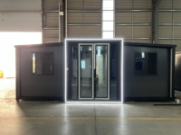 Villa modulaire préfabriquée avec entrée LED, studio moderne gris anthracite pour bureau à domicile dans la cour