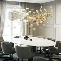 Lustre de plafond ovale personnalisable en or blanc pour mariage, design multi-éléments, verre doré, pour projets hôteliers