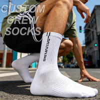Chaussettes de sport décontractées en coton doux, brodées avec logo personnalisé, à faible MOQ, en jacquard, anti-humidité, pour l'automne