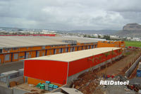 Edificio de Estructura de Acero, Kits de Construcción Metálica Prefabricada con Marco de Hierro Rojo, Almacenes Comerciales, Talleres, Panel Sándwich, Moderno y Resistente