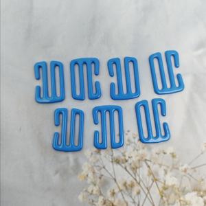 Anillos y deslizadores metálicos elegantes con diseño de ojo para sujetadores, accesorios de lencería, cierres de 8 y 9 ganchos, personalizados al por mayor para trajes de baño. - Product Image 1