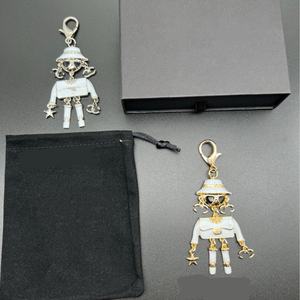 พวงกุญแจโลหะสังกะสีอัลลอยสำหรับตกแต่งกระเป๋าจี้ดีไซน์หุ่นยนต์หรูหรา - Product Image 2