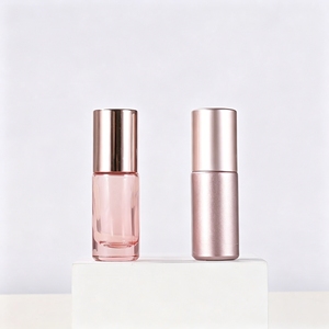 Vente en gros à prix réduit : flacon vide en verre rose doré de 5 ml et 10 ml avec bouchon à bille pour huile de parfum - Product Image 1