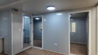 Maison conteneur pliable, extensible, étanche et à installation rapide avec aménagement personnalisé pour la cuisine et les projets résidentiels
