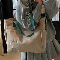 Sac fourre-tout en toile pour femme, sensation haut de gamme, grande capacité, style porté épaule, collection automne 2025, broderie animale fraîche et douce, fermeture éclair