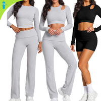 Ensemble de yoga athlétique 2 pièces taille haute séchage rapide uni avec crop top à manches longues et découpes aux épaules et short legging pour la gym et la course