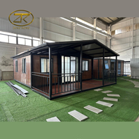 Maison de conteneur extensible pliable modulaire préfabriquée mobile de luxe de 20 pieds avec 2 chambres à coucher et une salle de bain complète