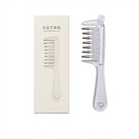 Peigne applicateur transparent à dents larges pour soins du cuir chevelu et des follicules pileux, idéal pour l'application d'huiles essentielles