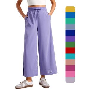 Pantalon de printemps personnalisé vierge taille élastique avec cordon de serrage réglable pantalon large en polyester à séchage rapide pour femmes avec ourlet fendu - Product Image 1