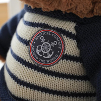 Fabrication sur mesure d'ours en peluche super mignons, fabricant d'animaux en peluche en coton, jouets en peluche doux avec logo de l'entreprise sur t-shirt
