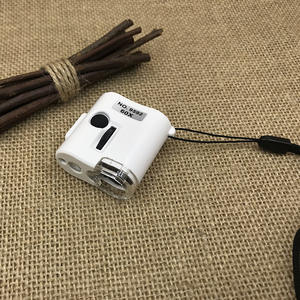 مكبر مجوهرات محمول صغير رقم 9592 أبيض اللون بحجم 60x مع ضوء LED وأشعة فوق بنفسجية وحزام تعليق - Product Image 2