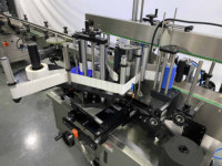Applicateur d'étiquettes à alimentation manuelle ESKO pour surfaces planes, boîtes, pochettes, sacs, pose d'autocollants adhésifs