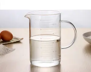 Tazza di vetro di cottura del succo di latte di vetro trasparente su ordinazione diretta della fabbrica con la maniglia e la scala
