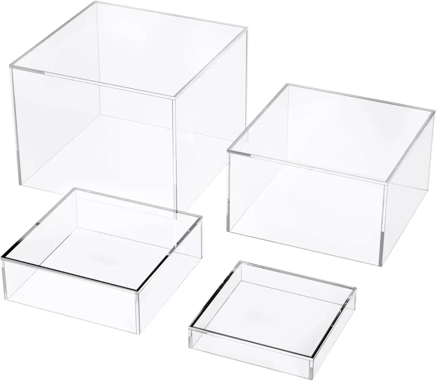 Ein set bestehend aus 4 transparenten kristall-acryl-boxwürfeln mit buffet verschachtelten rohren mit hohlem boden transparenz