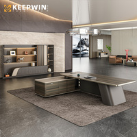 Alibaba Foshan mobilier de bureau usine moderne en forme de L pour patron ordinateur Table de direction en bois