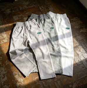 Pantalon de survêtement blanc ample pour homme, taille mi-haute, cordon de serrage, décontracté, en coton, pour l'automne, avec logo sur la jambe droite - Product Image 1