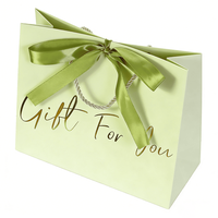 Sac d'emballage pour foulards et châles, sac cadeau vert avec inscription dorée et nœud en satin pour les produits d'accessoires de mode, cadeaux