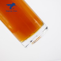Fabrication Luxury500ml 700ml 750ml 1000ml Bouteille en verre ronde Liqueur Spiritueux Alcool Bouteille en verre avec liège