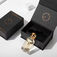 Emballage personnalisé pour huile de parfum pour homme, boîte-cadeau magnétique de luxe recyclable doublée d'une éponge avec logo imprimé en or noir