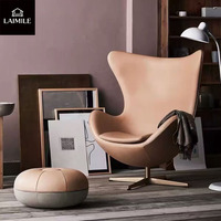Fauteuil de loisirs haut de gamme de style nordique, revêtement en cuir véritable, pivotant, pour la maison, la réception ou les espaces commerciaux